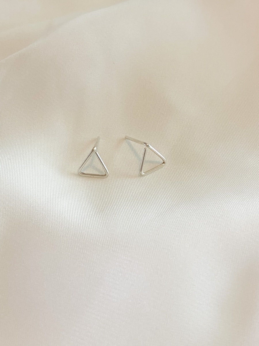 silver Stud Earrings on white background.